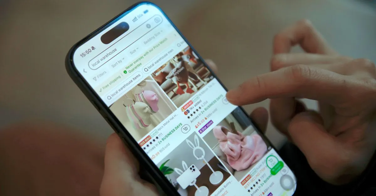 Person browsing shopping app on smartphone, displaying modern ecommerce interface.
