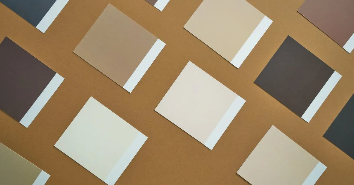 Flat lay of brown and beige paper swatches on a brown background, perfect for design inspiration.