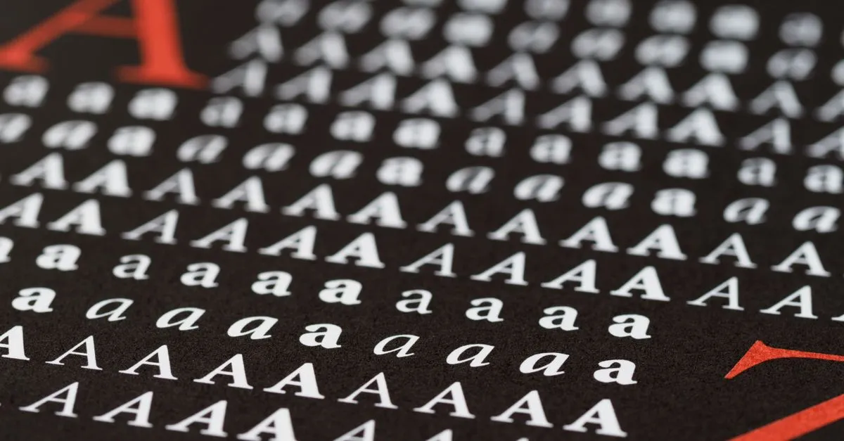 Close-up image showcasing various styles of the letter A in print, emphasizing typography diversity.