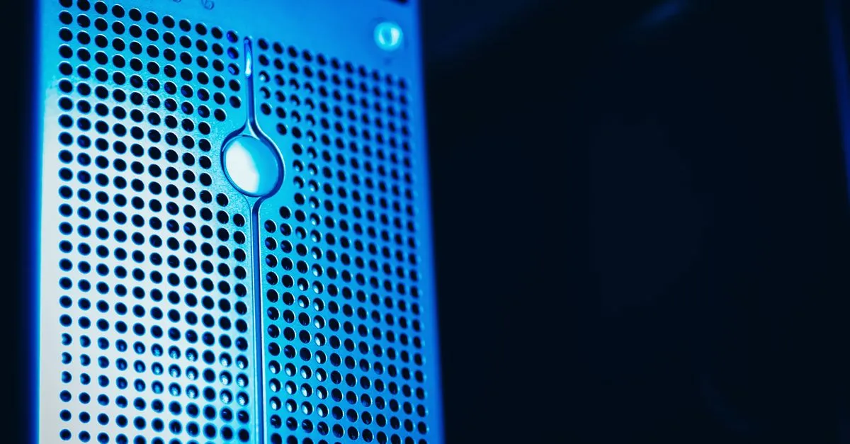 Modern server rack with blue lighting in a secure data center environment.