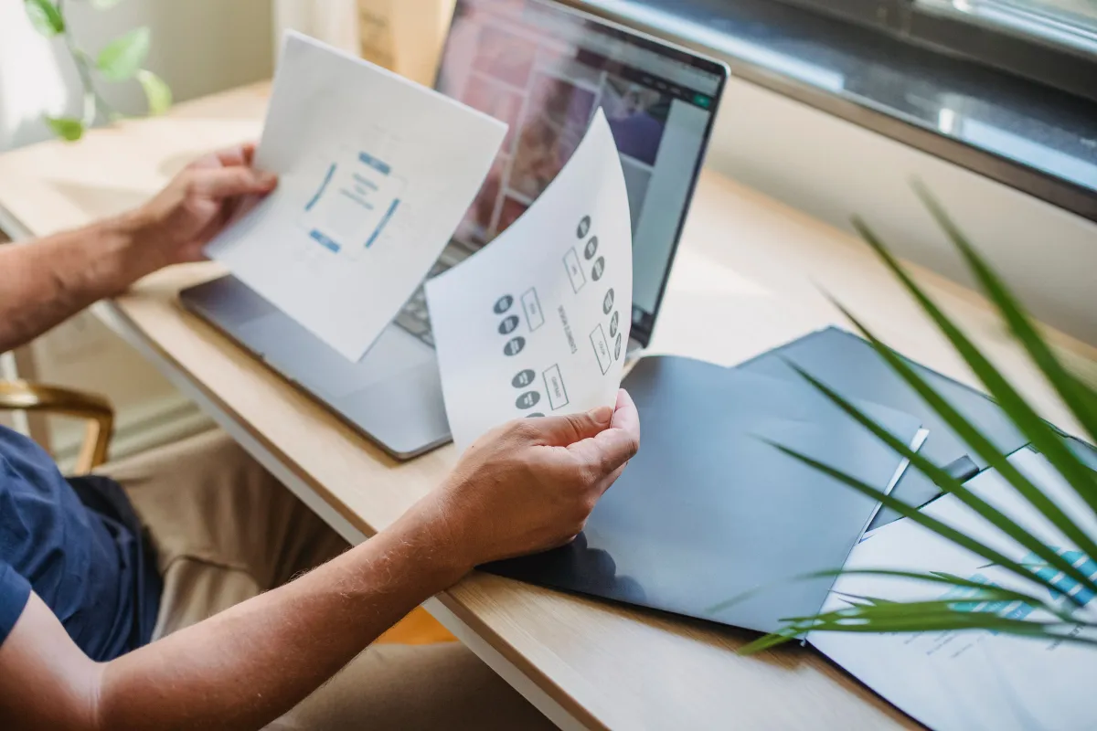 Two developers reviewing website wireframes together