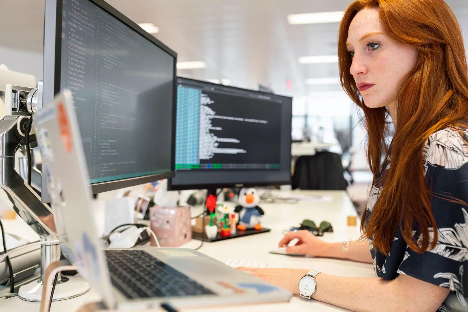 Developer finishing an unfinished website at office computer