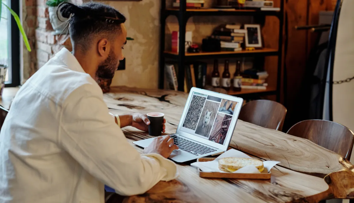 Restaurant interior with laptop showing online booking